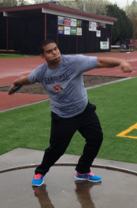 Senior Karl Sanft winds up to throw the discus.