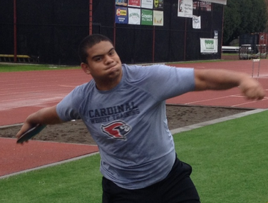 Karl Sanft, senior, practices the discus in preparation for the Lake Oswego Invitational, scheduled for April 4 at Lake Oswego High School.