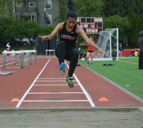 Freshman Simone Peters competes in the long jump.