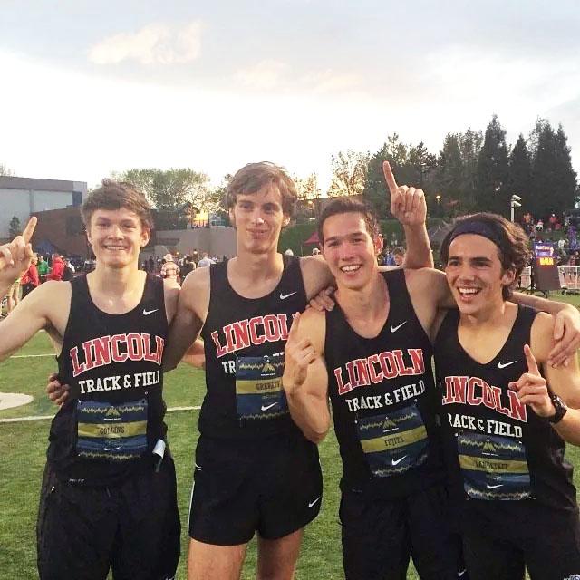 Displaying the joy of victory and being ranked seventh in the nation is the 4x800 relay team of (from left) Gabe Collins, Ransom Gravatt, Ryan Fujita, and Josiah Langstaff. They ran a time of 7:50.69 at the Jesuit Twilight Relays on May 2.