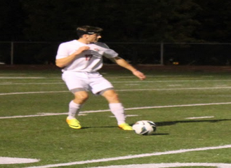 Senior defender Quin Gattey takes a free kick against Franklin.