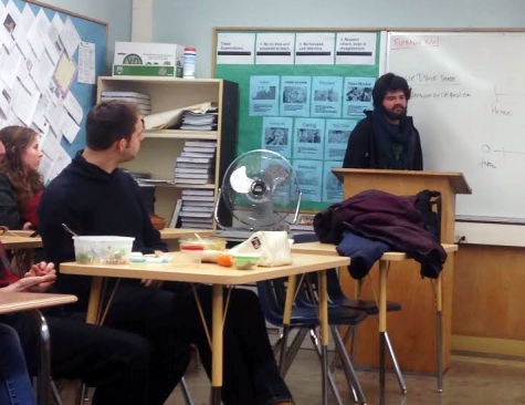 Senior Ryan Hindlin (right) talks with GSA members about the up-coming city-wide convention set for March 6.