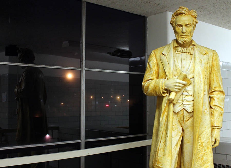 Abe waits for the sunrise on his birthday, Feb. 12. The school assumed Abraham Lincoln's name in 1909 when the nation celebrated the 100th anniversary of his birth. Anchoring the end of freshman hall, the statue was designed for the entryway of the school's previous building, which is now part of the Portland State University campus.