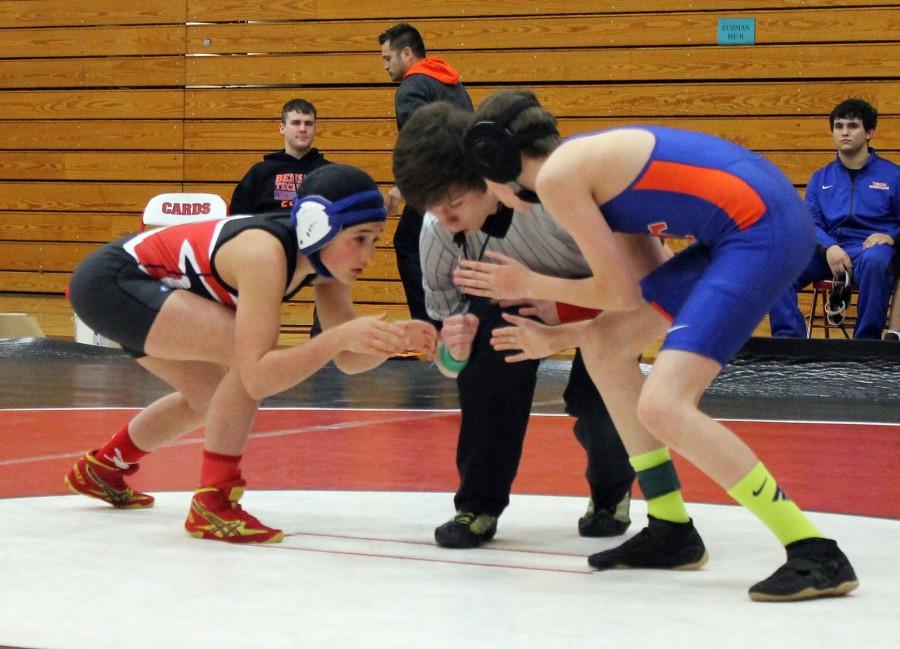 Trynadii Rocha prepares for battle with a Benson opponent. She won the match by a pin.