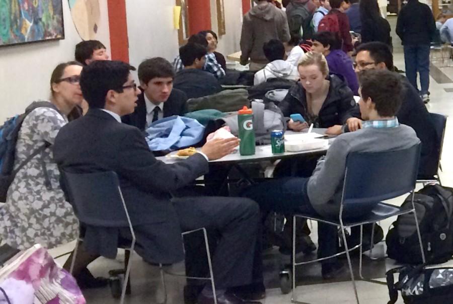Debaters await their rounds in the cafeteria during the Rose City Round Robin Tournament.  A total of 95 students from 16 schools competed.