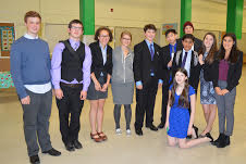 Lincoln and Cleveland speakers take a break from competition. Back row from left Miles Stepleton, four unidentified Cleveland students, Cedric Wong, and Lukas Schwab. In front are, from left:
Jay Sharabu, Laurel Douthit, Clara Schwab, and Kate Weeks.