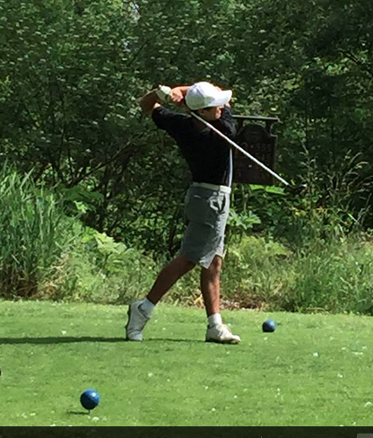 Junior Ben Stickney hits his tee shot on the #12 par five at Emerald Valley.