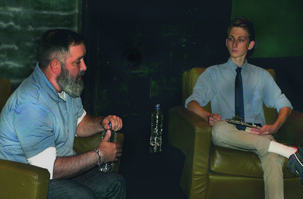 Junior Michael Ioffe (right) speaks with Rick Turoczy, chief executive officer of the Portland Incubator Experiment. 