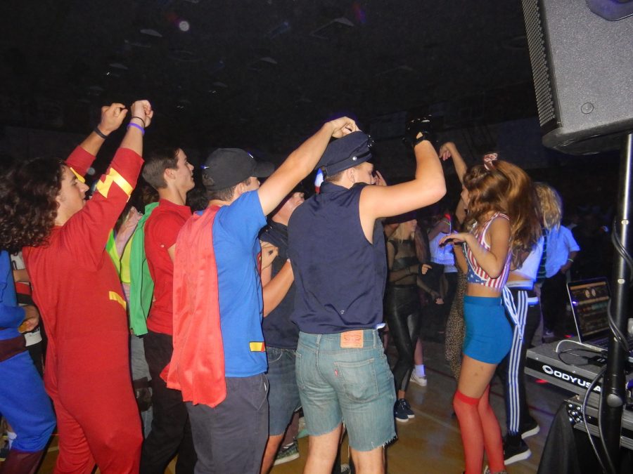 Students dance at the Homecoming Dance Friday in the gym.