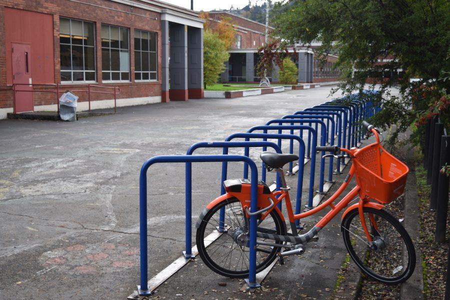 A Biketown bike sits on the rack outside Lincoln.
