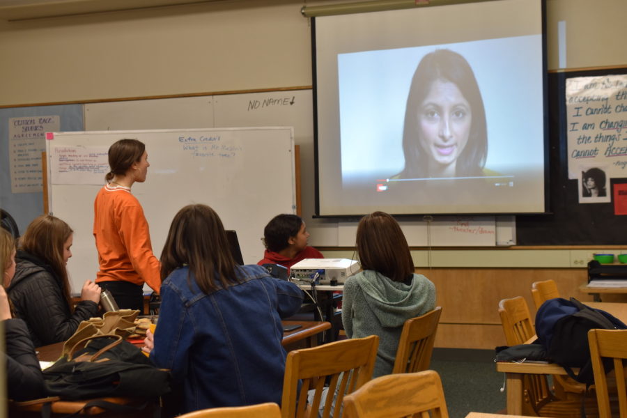 Members of the Student Resistance Club watch a video during a meeting March 14.