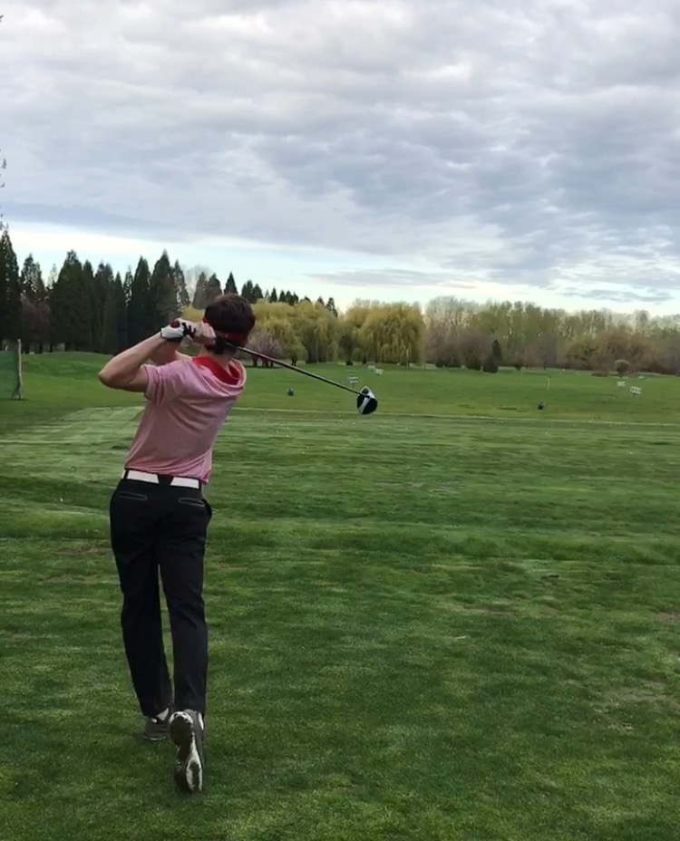 Sophomore Nate Stember hits a drive. 