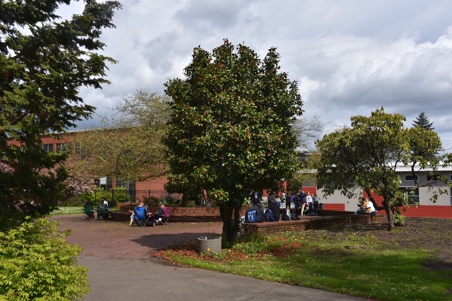 Students enjoy the sun in the Lincoln courtyard on April 18. The rays may benefit the students in the classroom, according to experts.