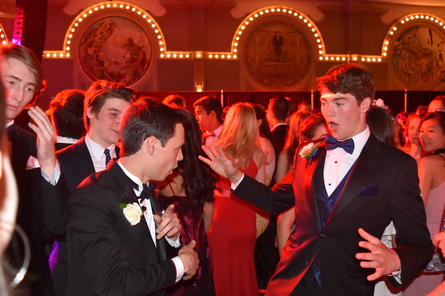 Juniors Nate Bradley (left) and Will Swindell dance at Prom May 6.