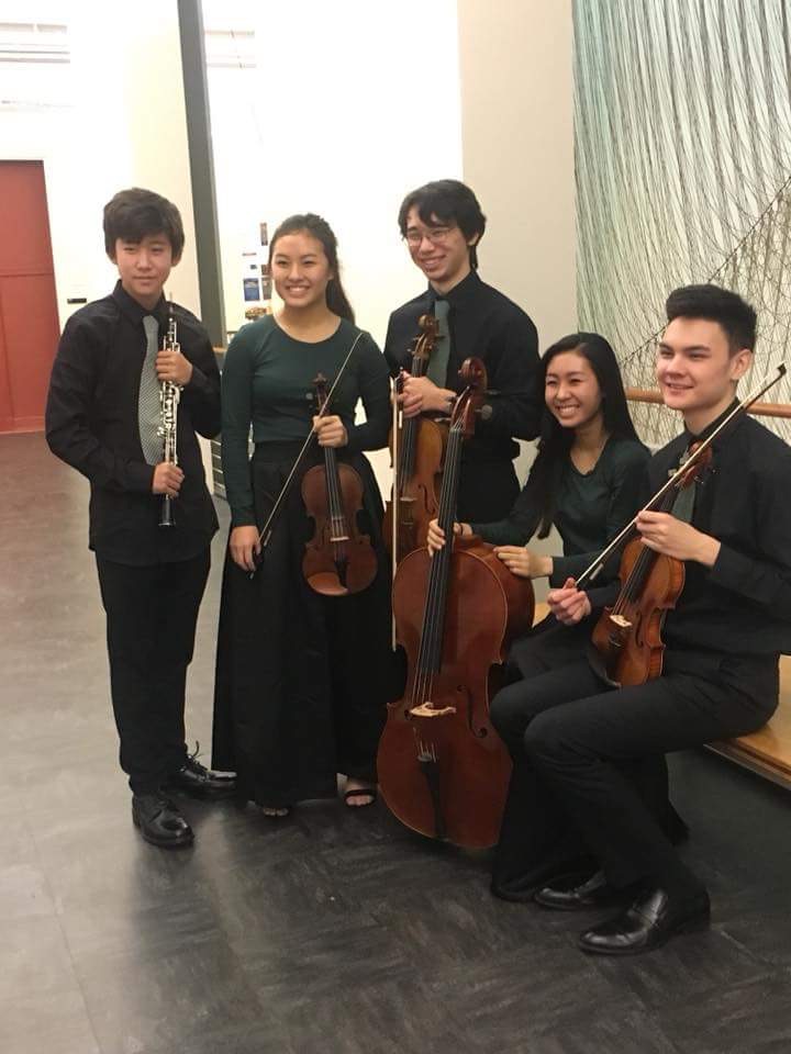 Freshman Elliot Shin (left) poses after a recent oboe performance. Shin is organizing a concert in
Korea’s demilitarized zone to promote peace between North and South Korea.