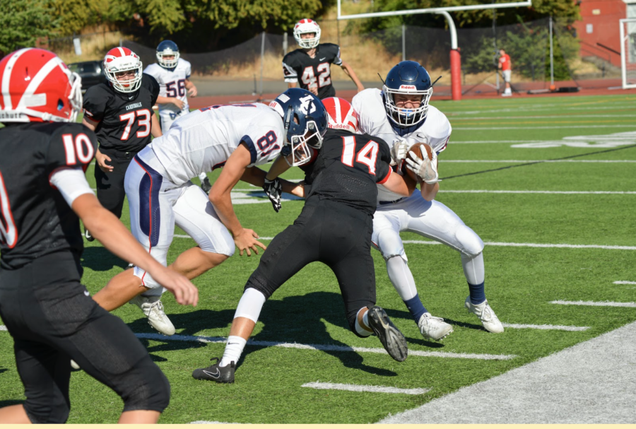 Football players collide during a September game. Concussions are a huge problem in high school sports, with around 300,000 high school related concussions occurring each year in the United States.