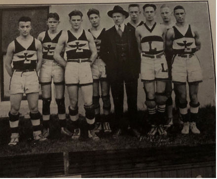 The 1919 boys’ basketball state championship team,
coached by George Dewey.