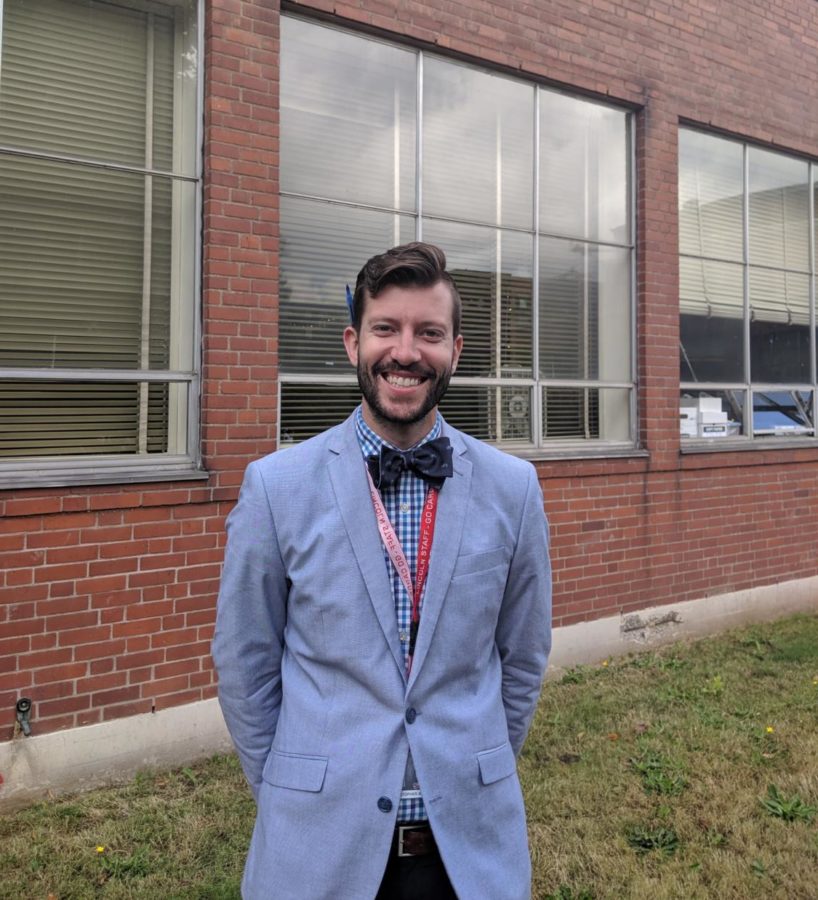 Chris Brida poses in the Lincoln courtyard. Brida is one of Lincoln's newest administators. 