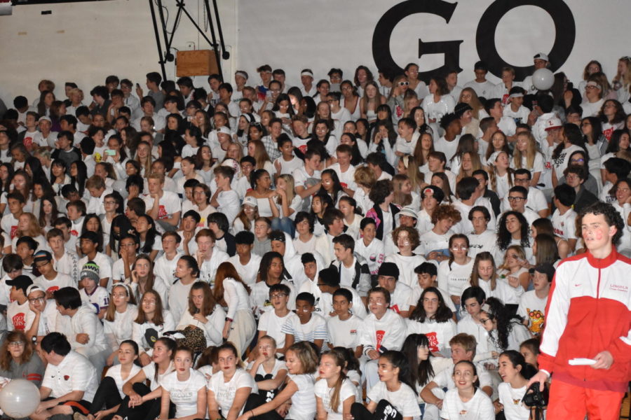 Class of 2022 in all white at the 2019 color wars assmbly.