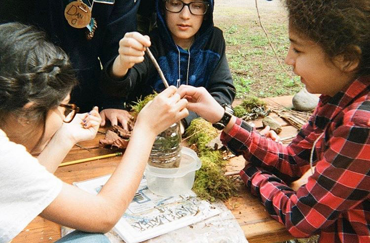 Students experiment with plants during Outdoor School at Camp Angelos in April 2019. Lincoln students have praised Outdoor School for providing a great opportunity for leadership and fun.