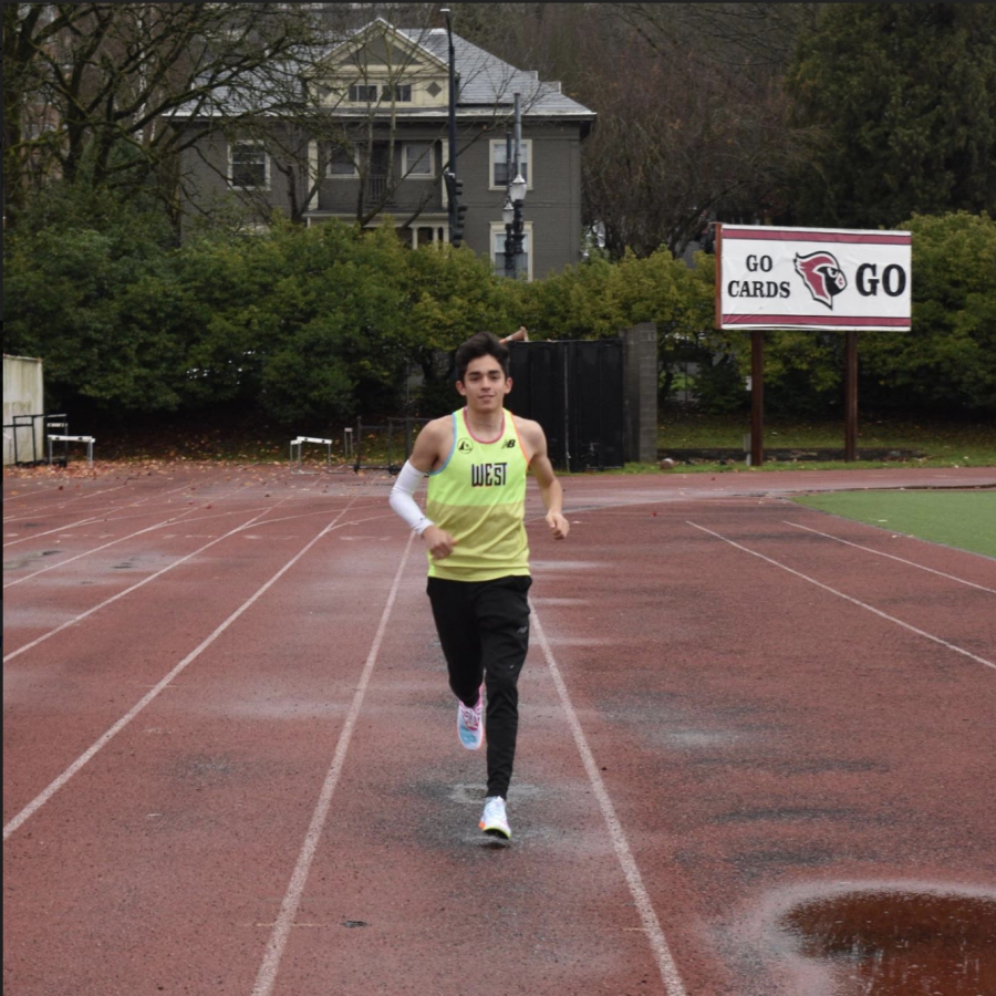Mateo Althouse jogs around Mike Walsh Field last winter, before construction started. Althouse has been keeping busy recently by running time trials by himself, running 8:36 for 3 kilometers last Saturday.