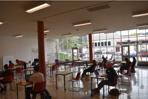 Students sit in the Lincoln High School Cafeteria during a period of hybrid learning. April 19 marked the first day of in-person learning since March 13, 2020, ending over a year of distance learning.
