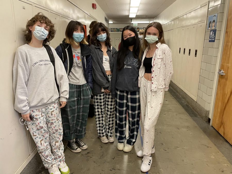 Seniors+celebrate+the+first+day+of+spirit+week+wearing+pajamas.+With+the+cancellation+of+the+annual+homecoming+dance%2C+students+are+still+finding+ways+to+show+their+school+spirit.+%0A