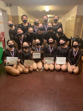 Lincoln’s dance team celebrates after the awards ceremony at the Portland Interscholastic League (PIL) competition. Their State competition will be on Mar. 19 at Oregon City High School. 