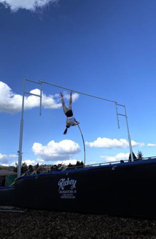Junior Nicole Prall attempts the pole vault event. Her standing record is a school best at 12 feet six inches.