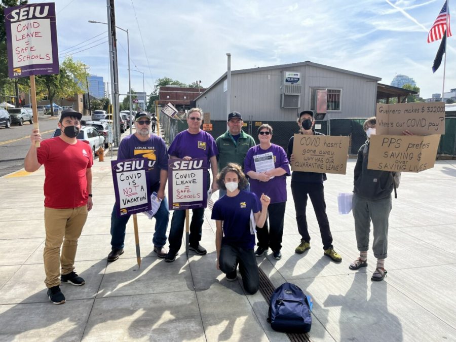 Members of Service Employee International Union (SEIU) picketed in front of the Lincoln building during the open house, pushing for PPS to renew the Covid leave agreement