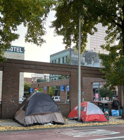 Two tents block the sidewalk on NW Everett. In the coming months, tents and encampments will be removed from sidewalks in accordance with new city council resolutions.
