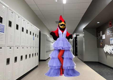 The Cardinal gets ready for prom in the sixth floor hallway.

