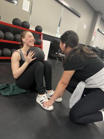 Members of the Weight Training Club “getting jacked.”