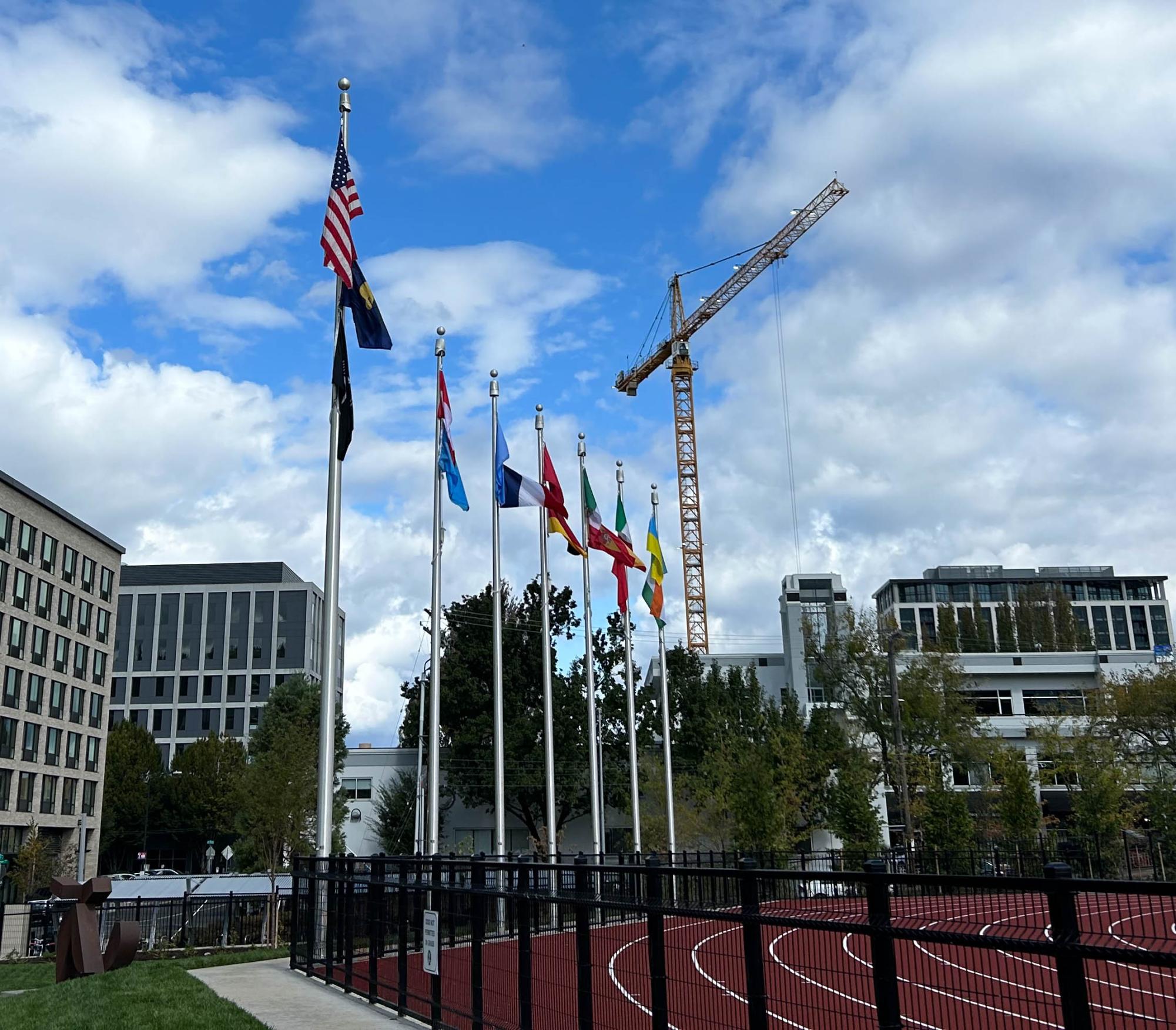 The U.S., Oregon, and POW MIA (Prisoner of War Missing In Action) flags fly on Lincoln’s tallest flagpole. Two flags have been put up on each of the smaller poles, featuring flags from various countries.
