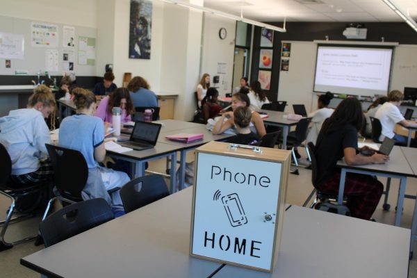 Lincoln's new phone policy requires students to lock their phones in a box for each class period. The school designed this policy to improve mental health and academic performance.