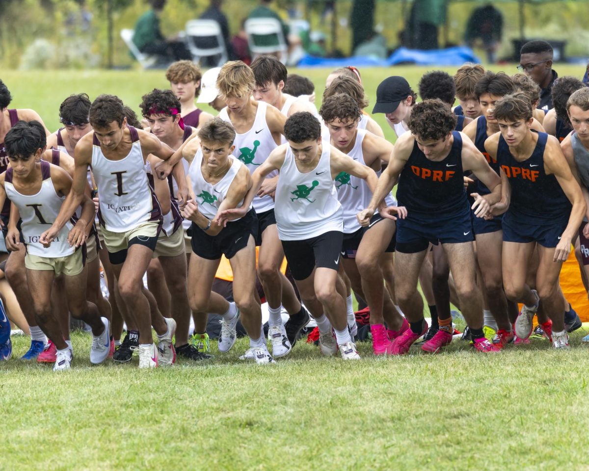 Members of Lincoln's cross country team prepare to race.  

Photo courtesy of Eric Dettman.