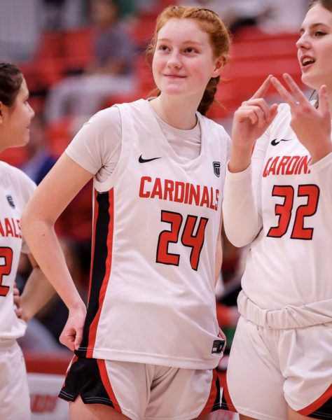 Sophomore and varsity girls basketball player Hannah Greene is gazing up at the scoreboard before their win over McDaniel High School.

Courtesy of Sarah Quist