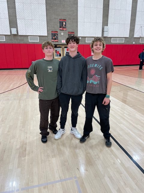 Sophomores Will Harriff, Jackson Mosebach and Elliot Brandt are on the court together after a win in the 3 on 3 basketball tournament.

Courtesy of Travis Johnson