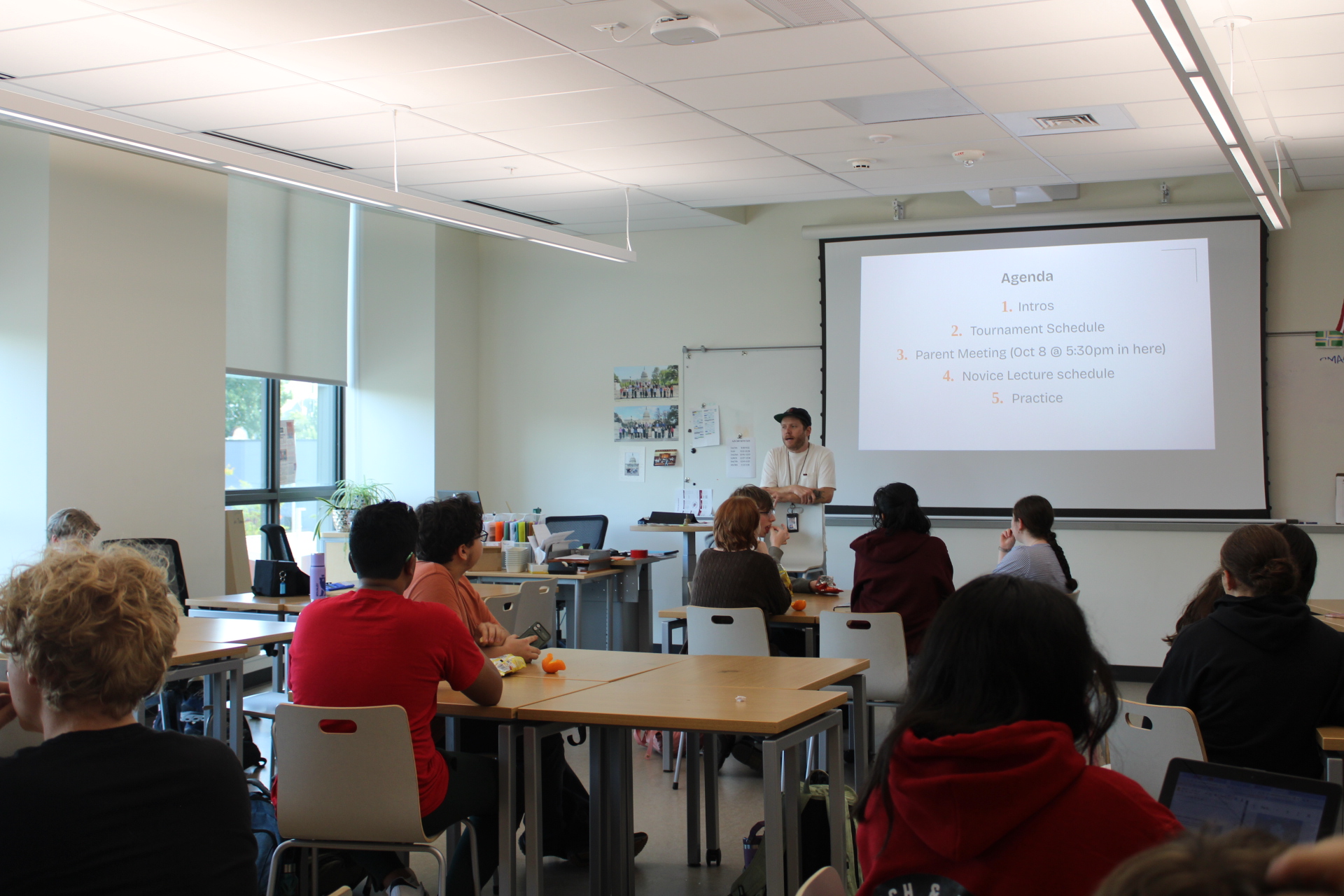 Club Advisor Ben Harrison shares the agenda for debate practice. By Nia Langford
