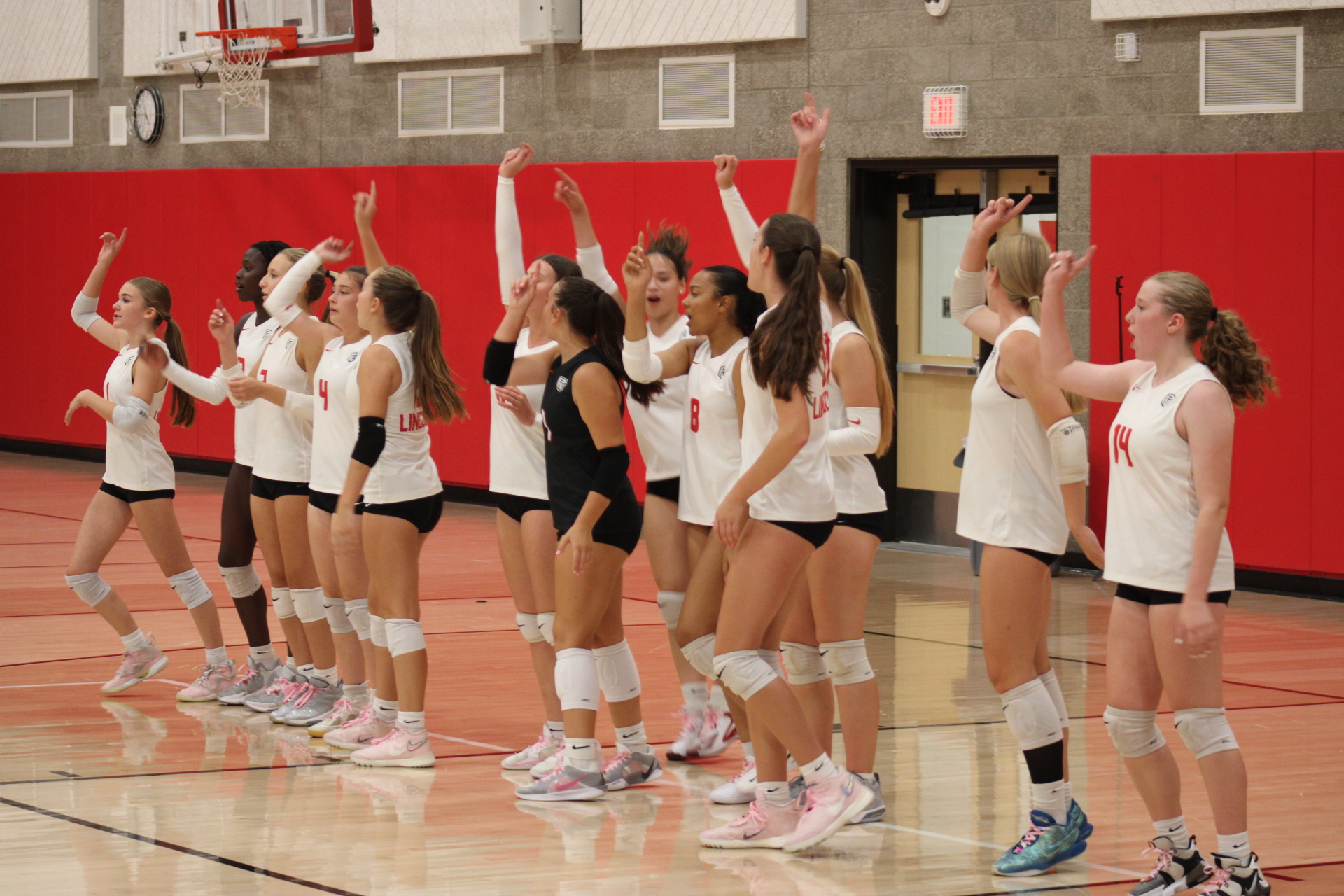  The volleyball team gets hyped up before a game. Courtesy of Kelsey Jorgenson. 