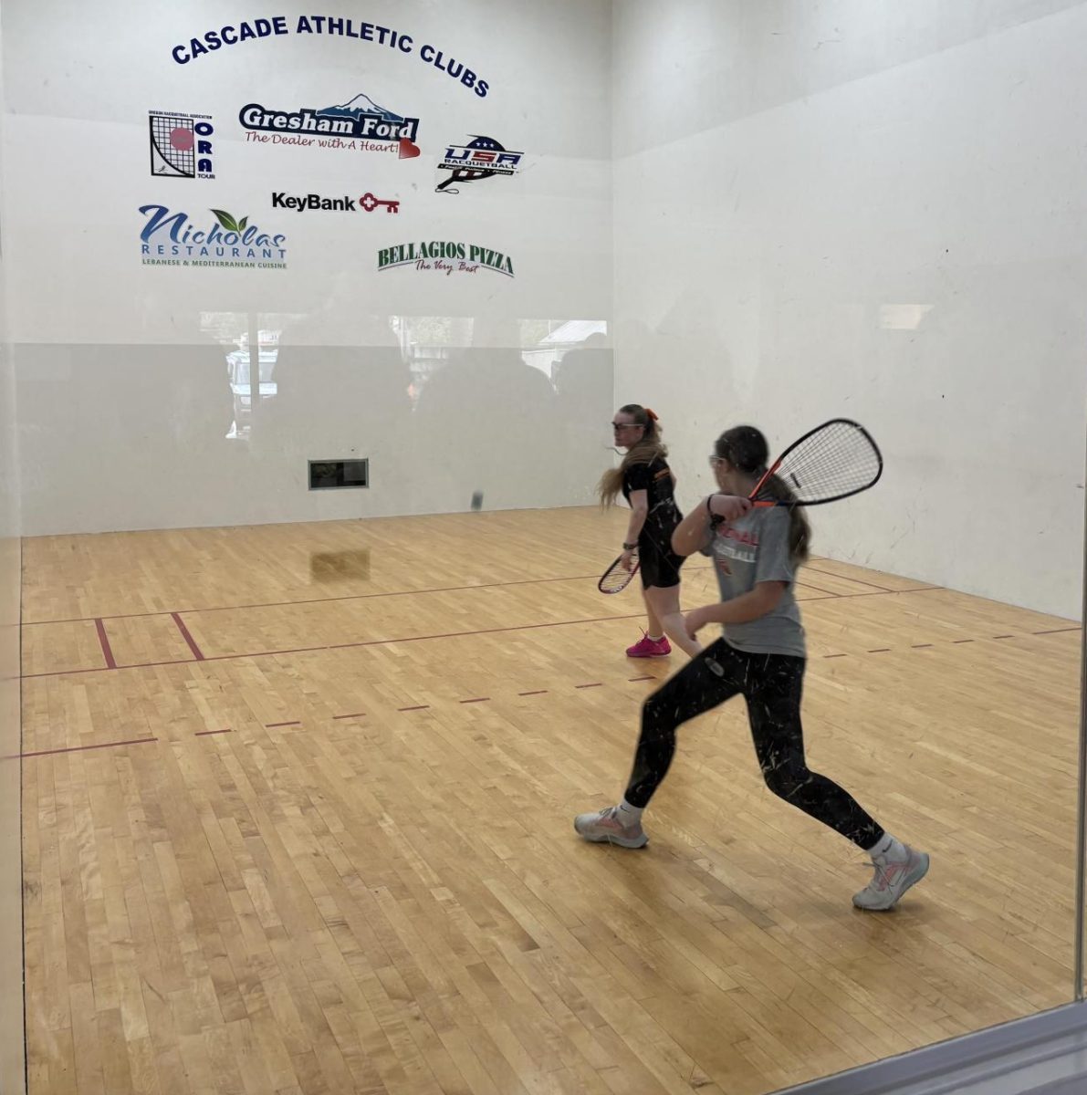 Racquetball tournaments can last three to five hours and up to eight at the state championship, but a strong community helps keep students motivated throughout the competition. Courtesy of Julia Armstrong.