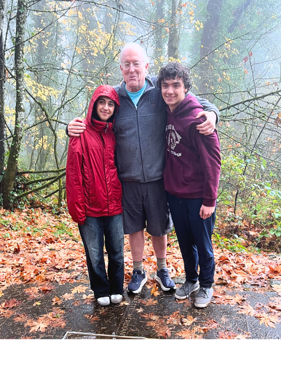 Two students in the Portland Supreme Project posing for a picture with Mr. Griffith. Courtesy of IAN CONINE-REYES