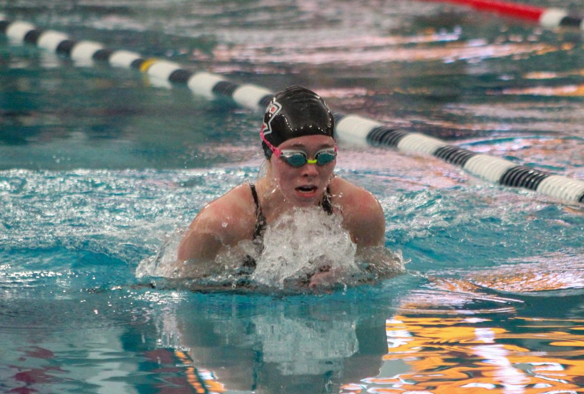 Junior Skye Schwartz won the 100-meter breaststroke state title on Feb. 21, finishing with a time of 1:03.08. Courtesy of AUSTIN WHITE